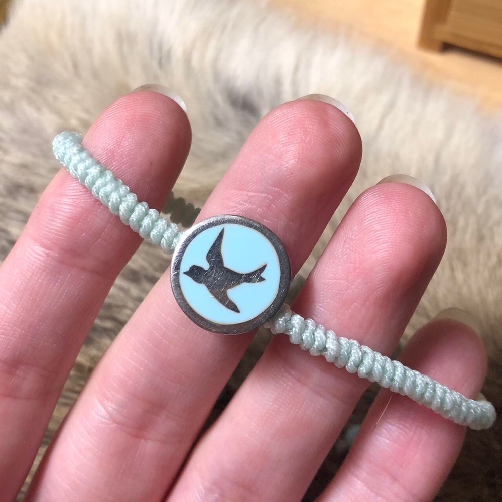 Sterling silver Baroni blue bird of happiness fabric chord bracelet